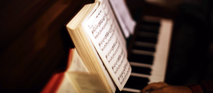 Hands playing piano
